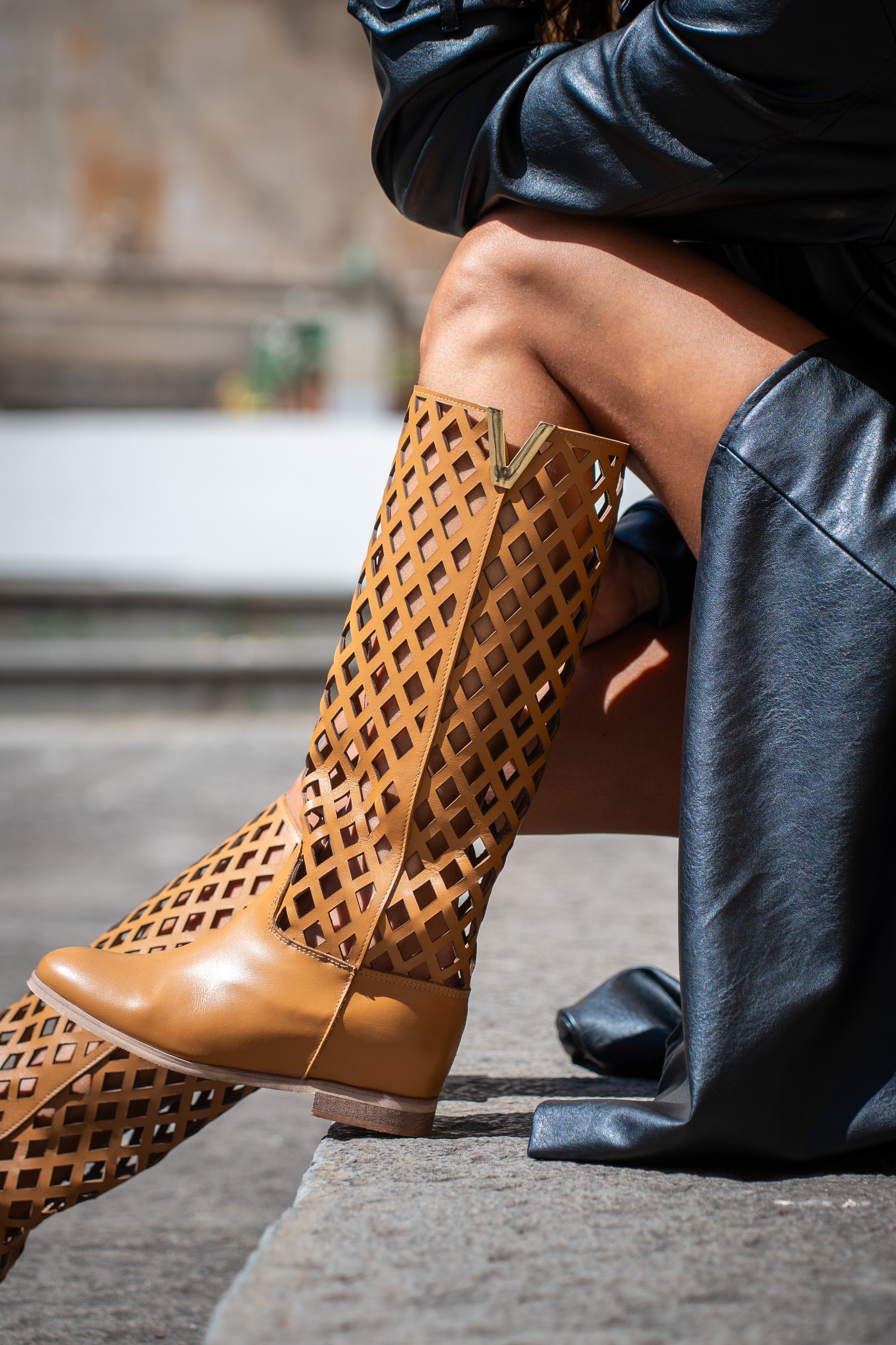 R120_NET - Tubular boot in Perforated Black Genuine Leather with golden accessory and internal rise