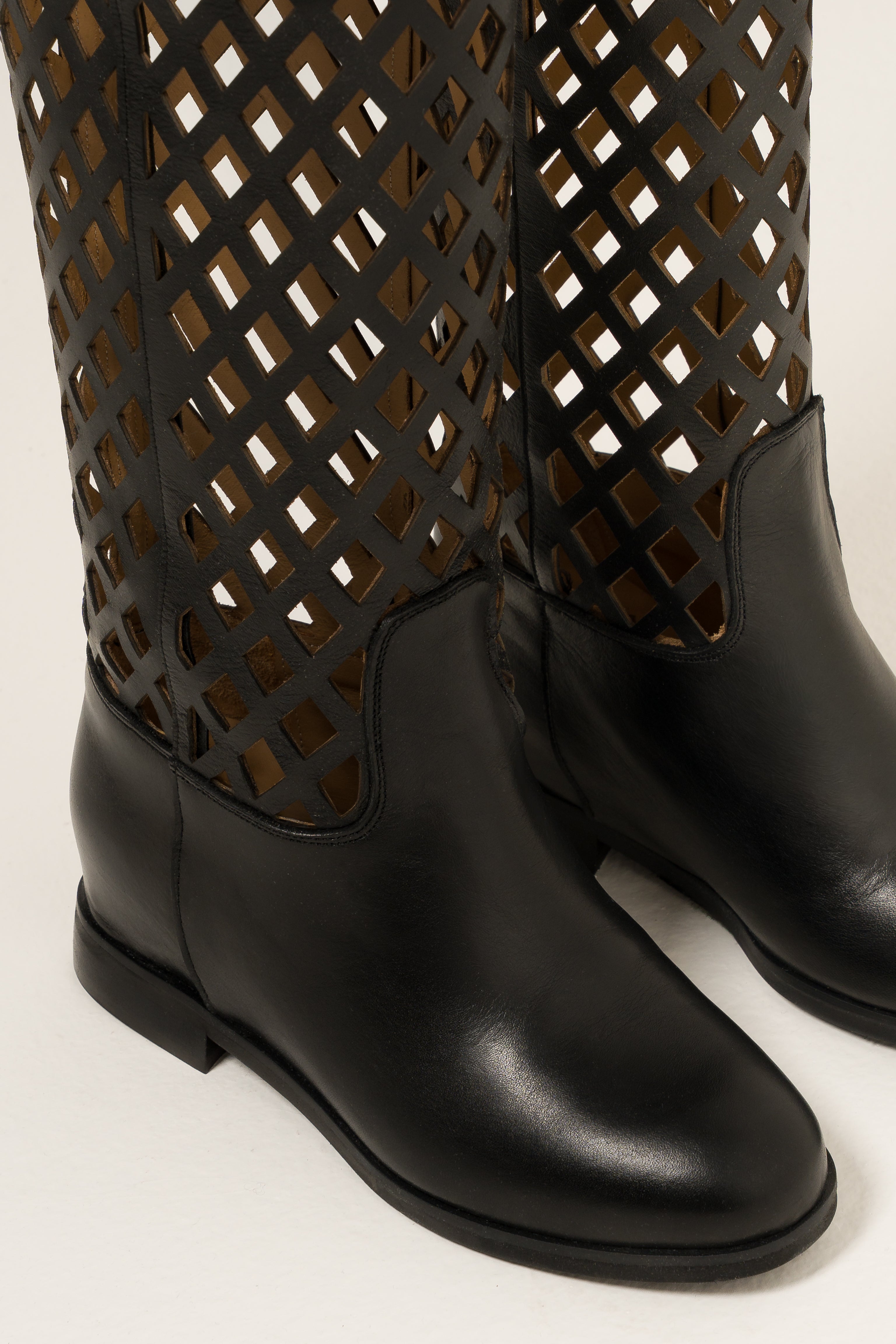 R120_NET - Tubular boot in Perforated Black Genuine Leather with golden accessory and internal rise