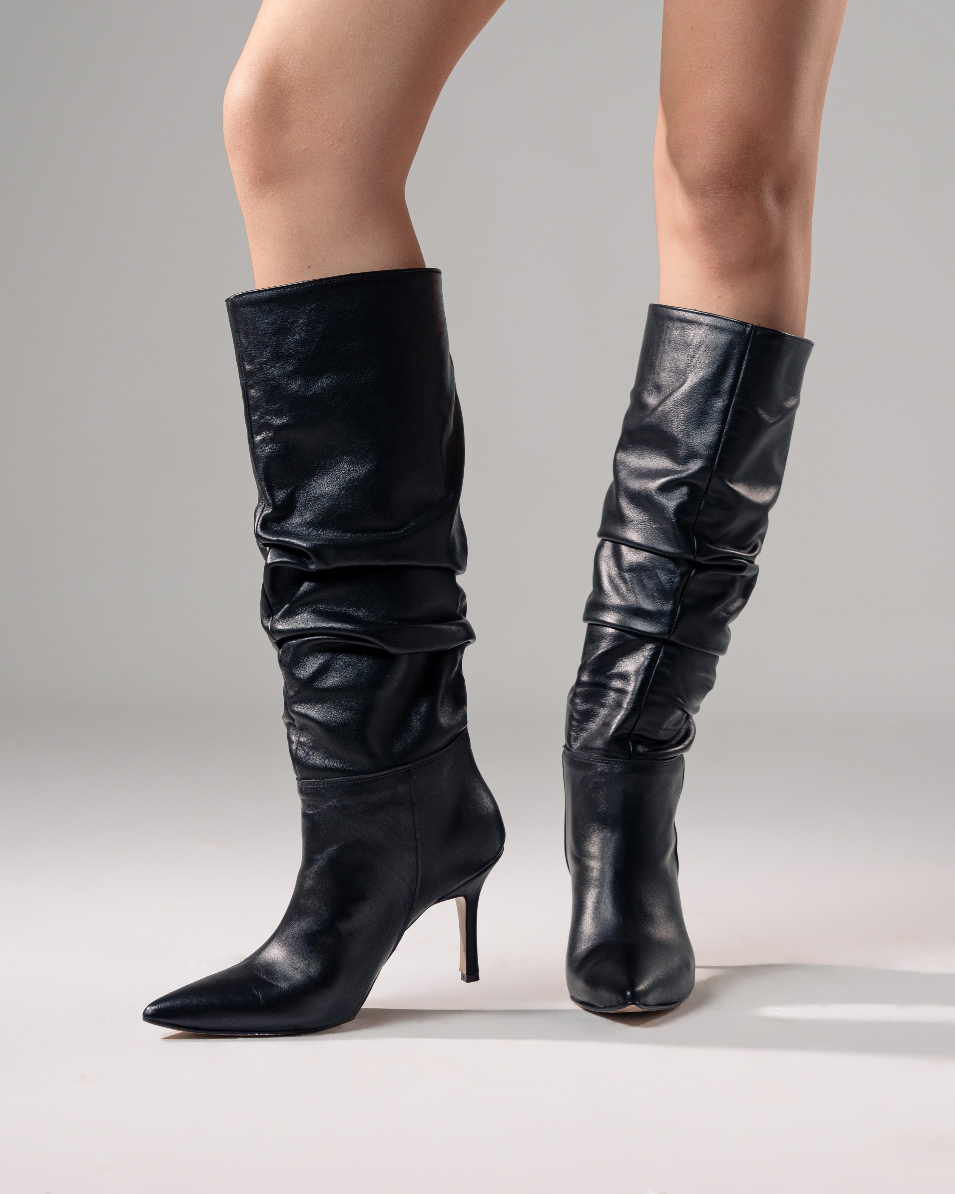 CURLY 100 - Draped effect boot in black genuine leather with 9 cm stiletto heel