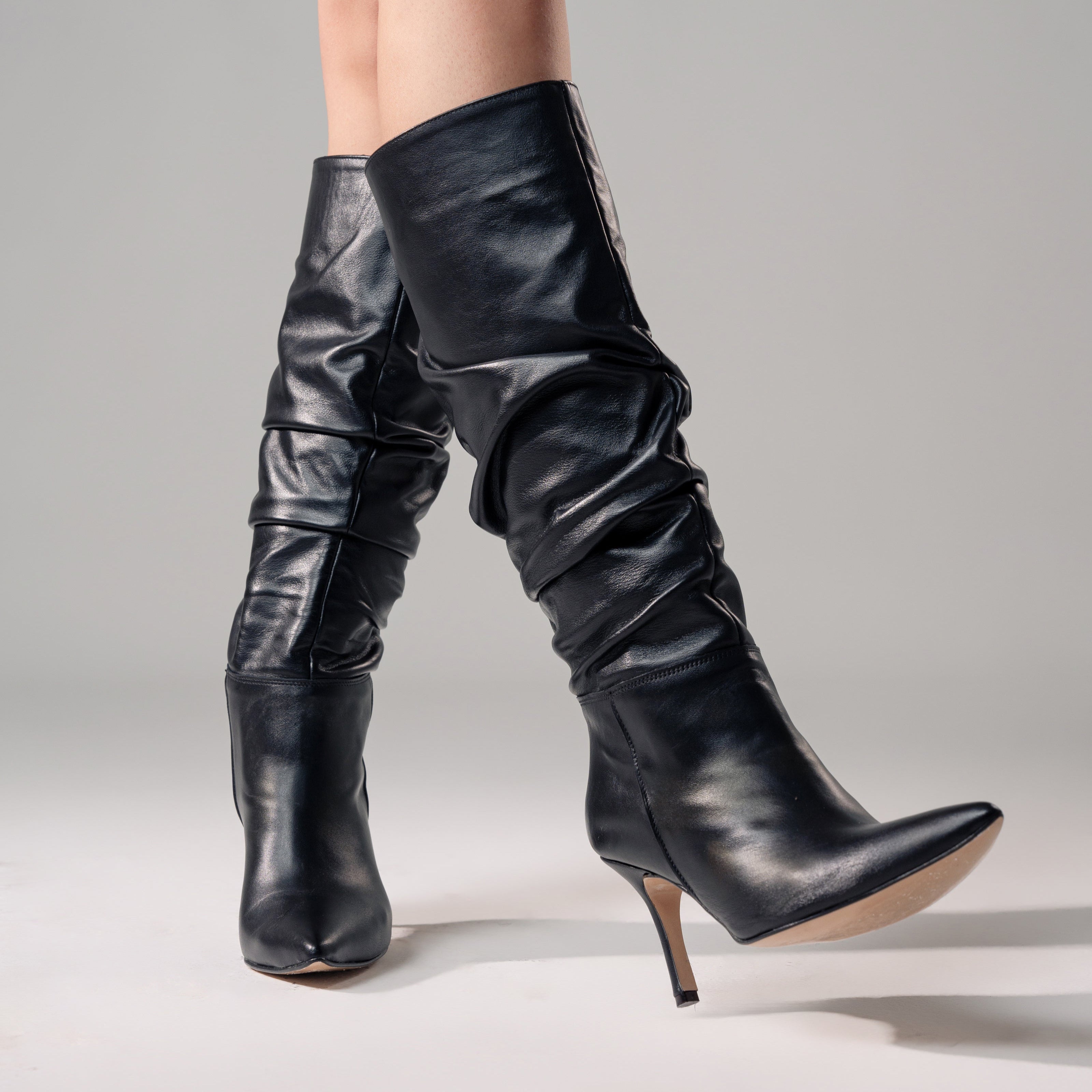 CURLY 100 - Draped effect boot in black genuine leather with 9 cm stiletto heel