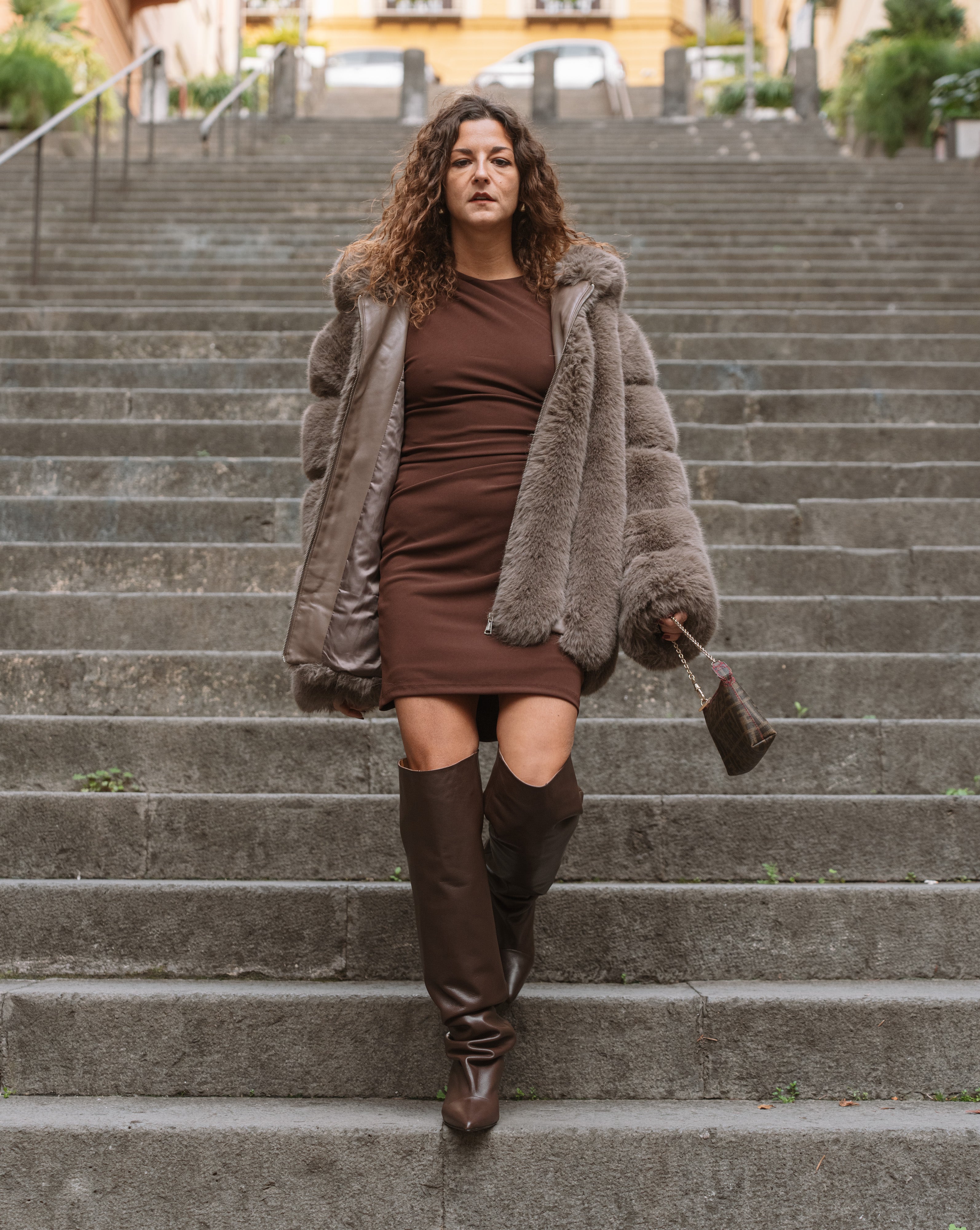 JENNIFER - Knee-high tubular boot in genuine Chocolate leather with draped effect. 5 cm heel.