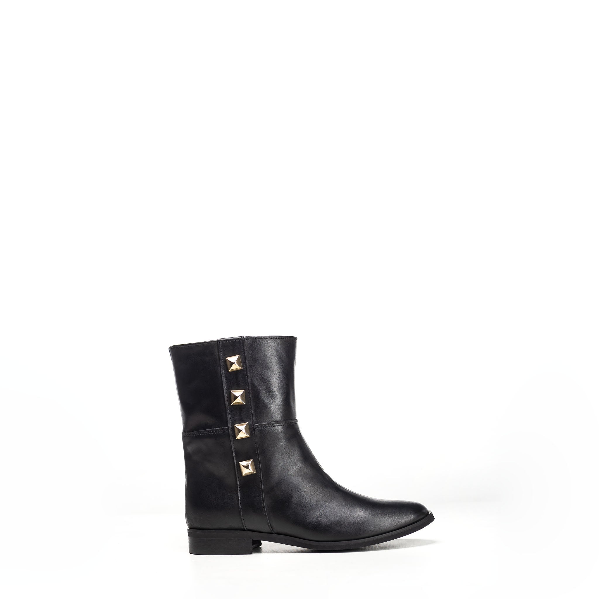 1132 - Tubular ankle boot in genuine leather with golden pyramid buttons