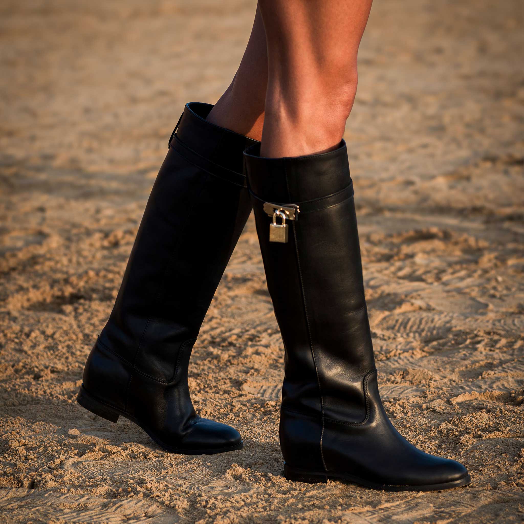 ELYZABETH - Black Genuine Leather Tubular Boot with Strap and Gold Accessory and Internal Lift