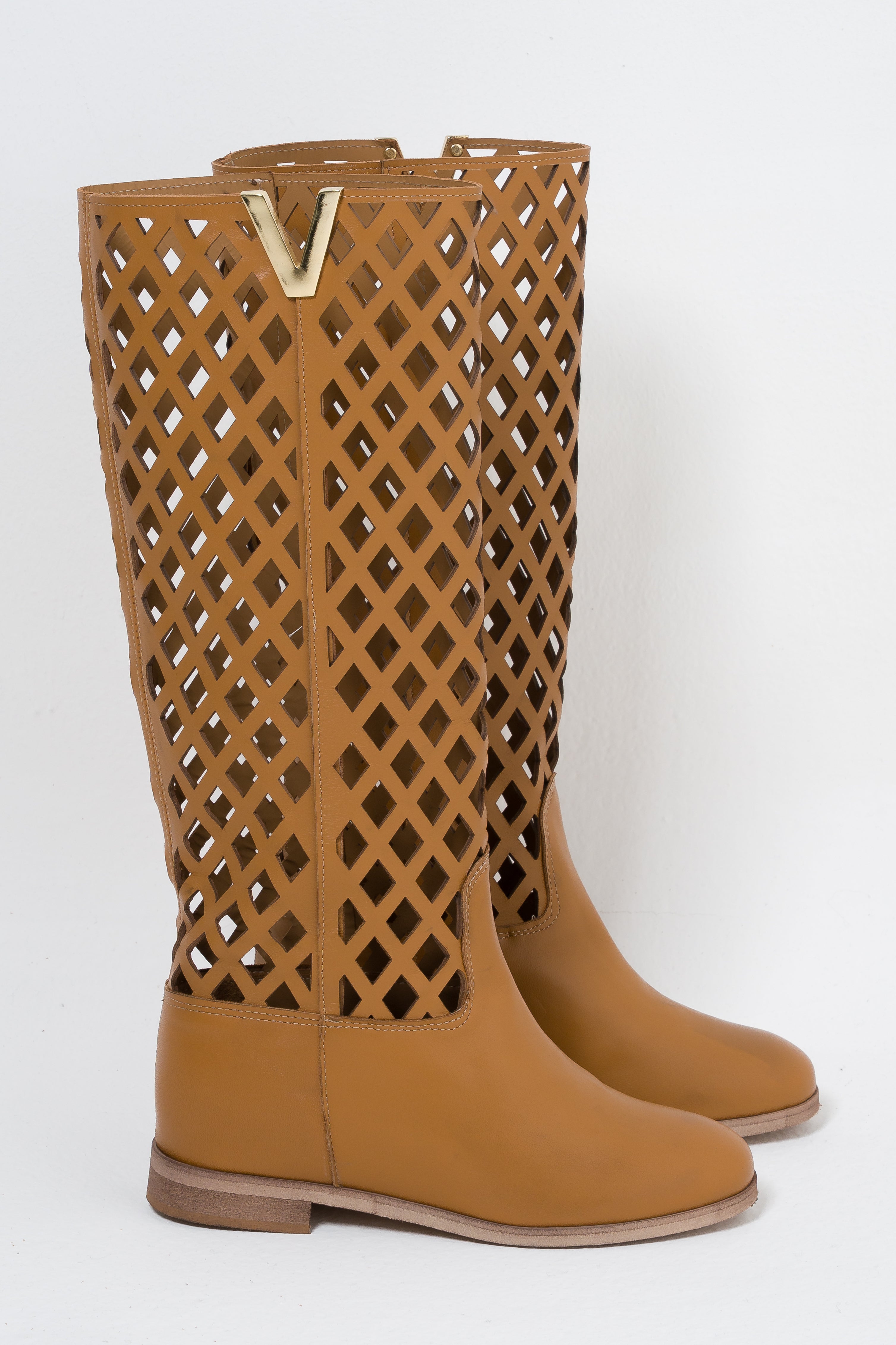 R120_NET - Tubular boot in Perforated Black Genuine Leather with golden accessory and internal rise