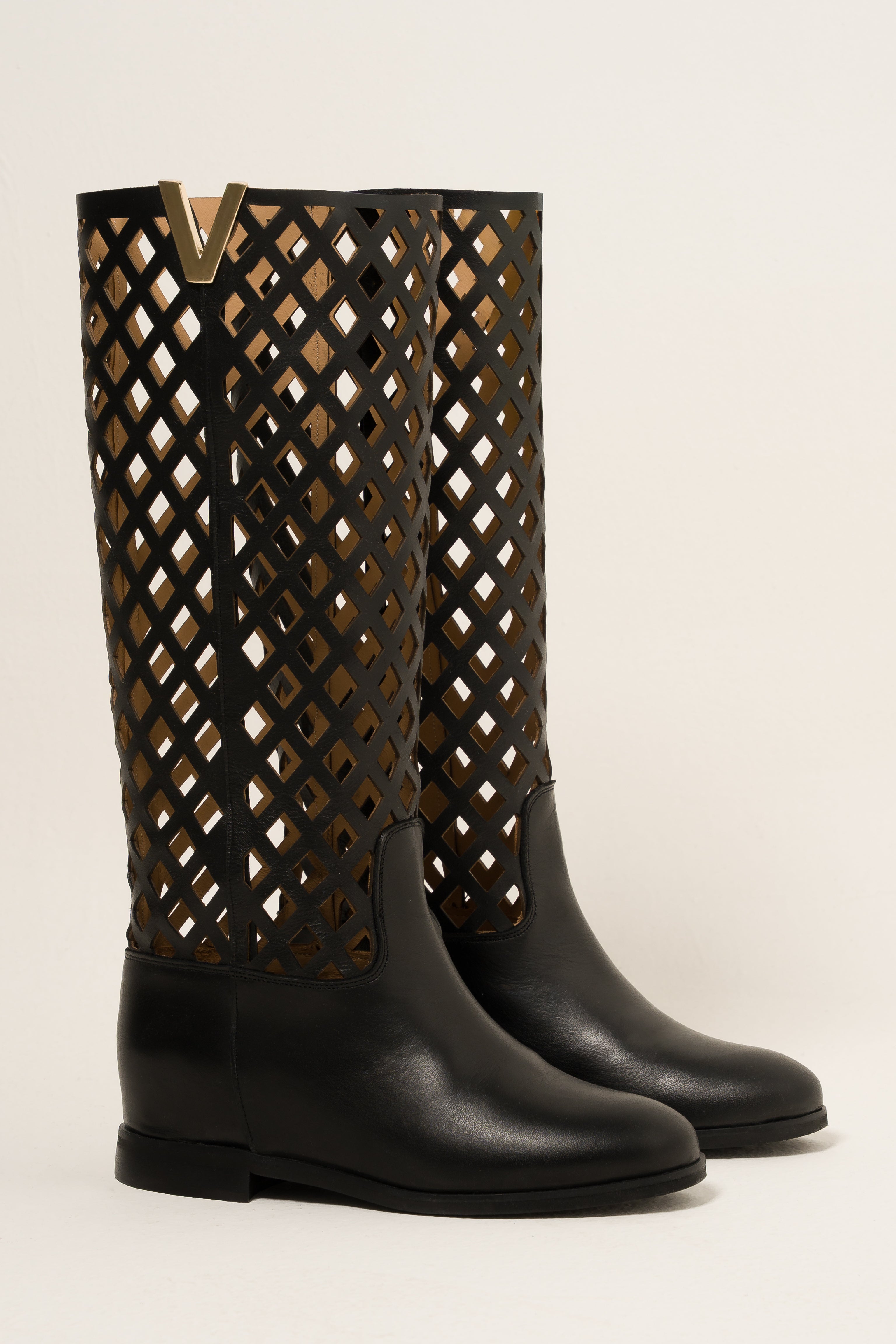 R120_NET - Tubular boot in Perforated Black Genuine Leather with golden accessory and internal rise
