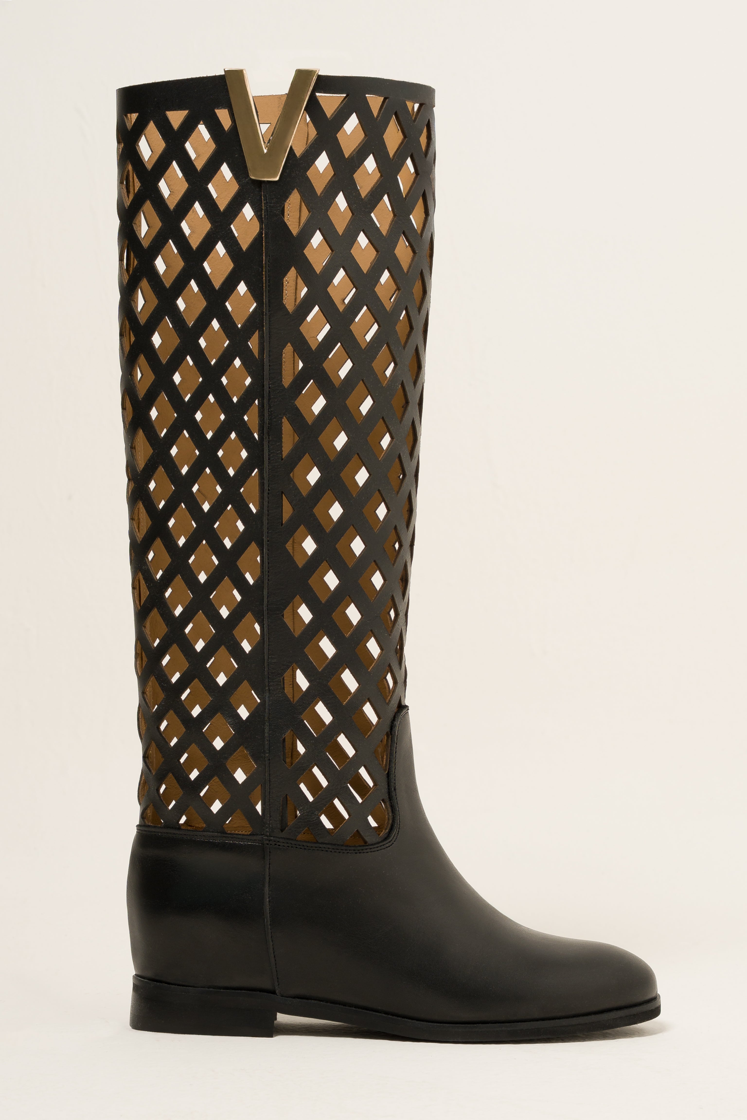R120_NET - Tubular boot in Perforated Black Genuine Leather with golden accessory and internal rise